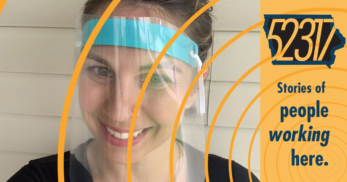 woman wearing ppe face shield