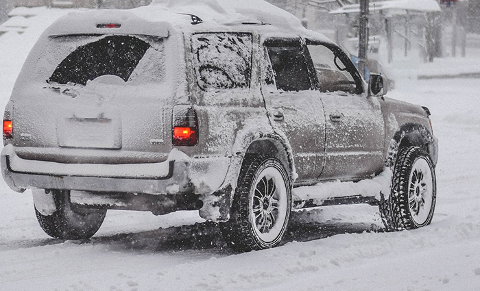 A car in a snow storm.