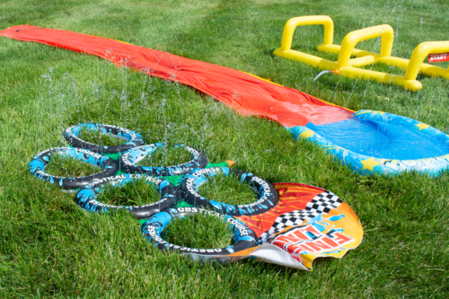 Water obstacles laid out in the grass