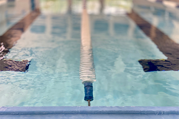 The empty lanes of the indoor pool.