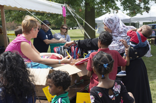 Community members get ready for the school year at the Back to School bash