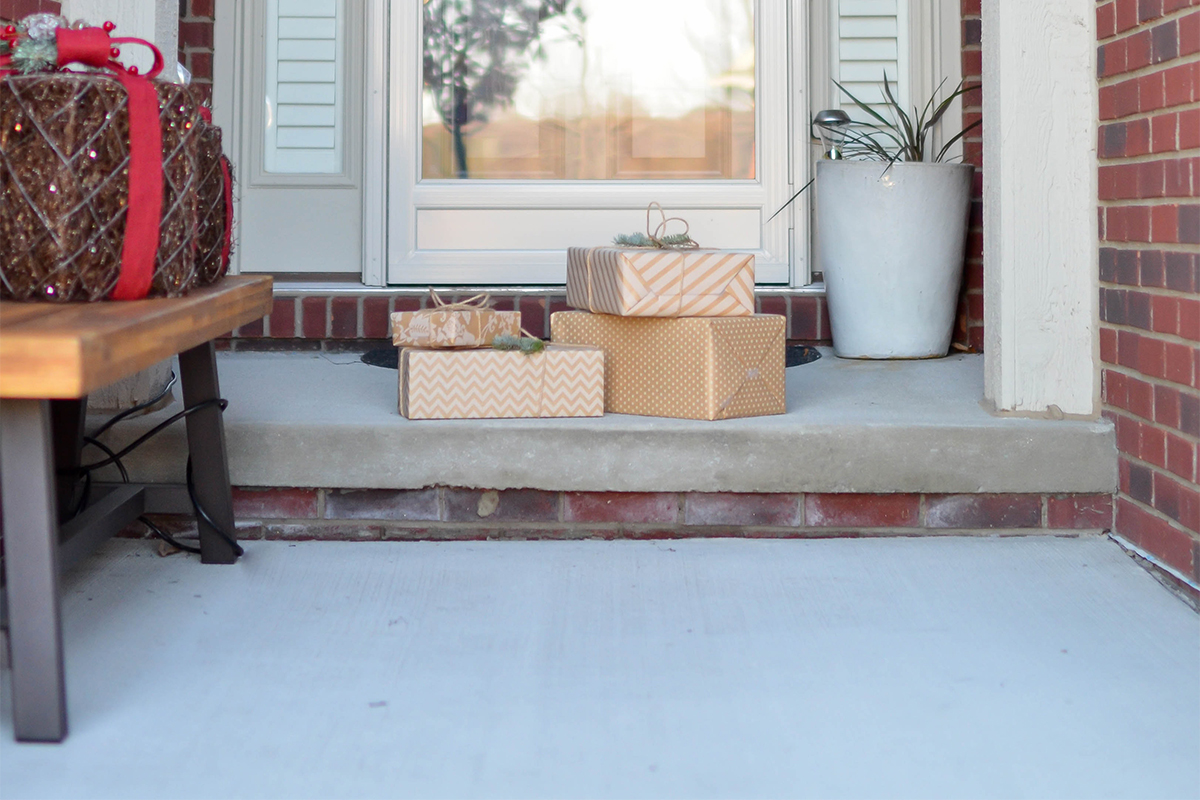 Packages sit outside a front door.