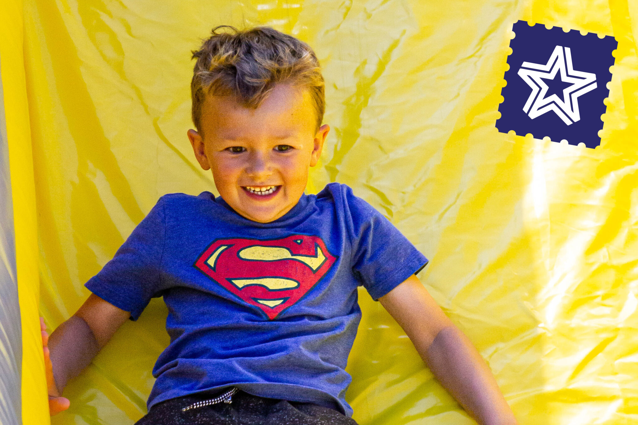 Kid on inflatable slide